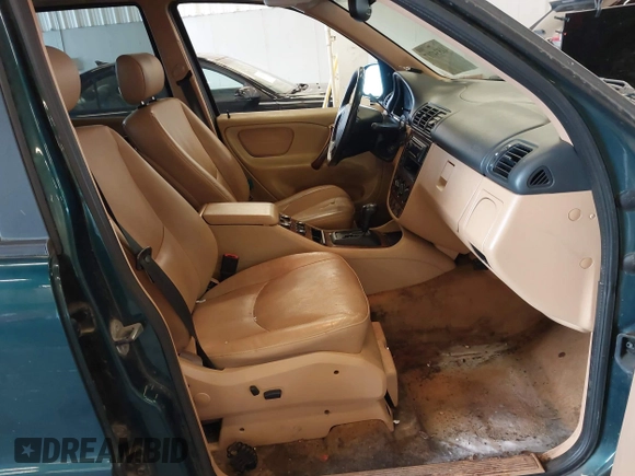 1998 Mercedes-Benz M-Class with VIN 4JGAB54E1WA011086, listed as a IAAI auction lot 41534717 with 186,273 mi miles. Bid and sale history available at carsss.com. Image 5.
