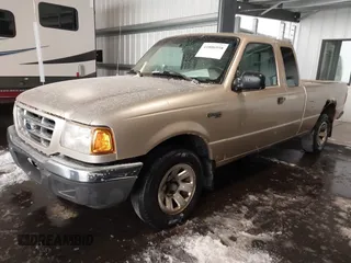 2001 Ford Ranger XL with VIN 1FTYR14V31PB58474, listed as a IAAI auction lot 41806958 with 300,219 mi miles. Bid and sale history available at carsss.com. Image 2.