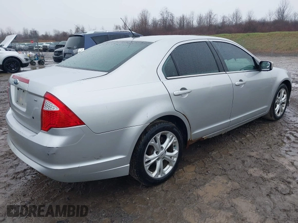2012 Ford Fusion SE with VIN 3FAHP0HA9CR164546, listed as a IAAI auction lot 42016566 with 185,251 mi miles. Bid and sale history available at carsss.com. Image 4.