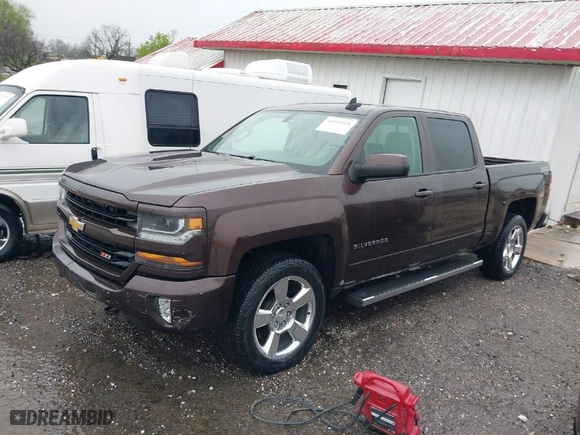 2016 Chevrolet Silverado 1500 LT with VIN 3GCUKREC1GG197043, listed as a IAAI auction lot 41953001 with 181,124 mi miles. Bid and sale history available at carsss.com. Image 2.
