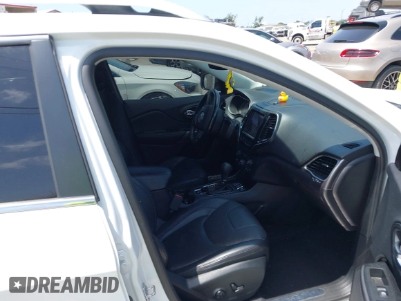 2019 Jeep Cherokee Limited with VIN 1C4PJLDB8KD402904, listed as a IAAI auction lot 42107306 with 96,677 mi miles and . Bid and sale history available at DreamBid. Image 5.