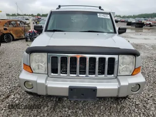 2007 Jeep Commander Sport z VIN 1J8HG48K97C598103, wystawiony jako Copart lot #65140225 z przebiegiem 204 638 mil mil oraz Czysty tytuł • Clean title. Historia ofert i sprzedaży dostępna na DreamBid. Obrazek 5.