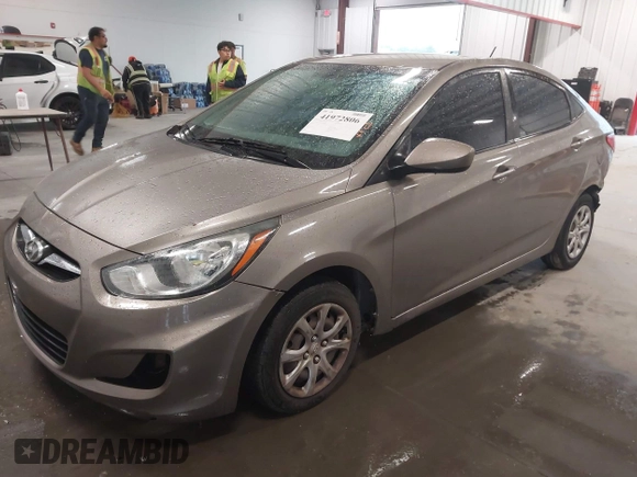 2013 Hyundai Accent GLS with VIN KMHCT4AE2DU486097, listed as a IAAI auction lot 41972806 with 295,949 mi miles. Bid and sale history available at carsss.com. Image 2.