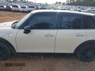 2015 MINI Hardtop 4 Door S z VIN WMWXU3C50F2B59450, wystawiony jako IAAI lot #41271841 z przebiegiem 70 719 mil mil oraz . Historia ofert i sprzedaży dostępna na DreamBid. Obrazek 15.