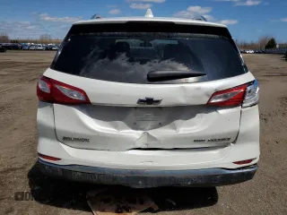 2021 Chevrolet Equinox Premier z VIN 2GNAXXEV6M6137669, wystawiony jako Copart lot #53437745 z przebiegiem 93 812 mil mil oraz Szkoda całkowita • Salvage title. Historia ofert i sprzedaży dostępna na DreamBid. Obrazek 6.