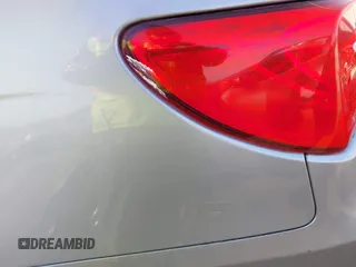2013 Chrysler 200 Touring z VIN 1C3CCBBB5DN614733, wystawiony jako IAAI lot #41826645 z przebiegiem 216 526 mil mil oraz . Historia ofert i sprzedaży dostępna na DreamBid. Obrazek 16.