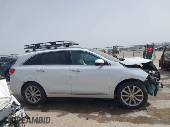 2017 Kia Sorento SX z VIN 5XYPK4A50HG275738, wystawiony jako IAAI lot #41748282 z przebiegiem Nie podano mil oraz . Historia ofert i sprzedaży dostępna na DreamBid. Obrazek 13.