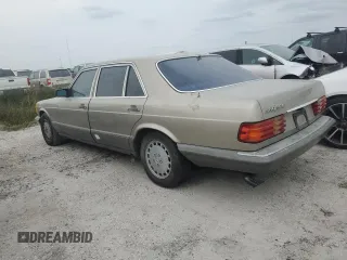1989 Mercedes-Benz 560 with VIN WDBCA39E1KA479955, listed as a Copart auction lot 76202804 with 132,546 mi miles and Salvage Title. Bid and sale history available at DreamBid. Image 2.