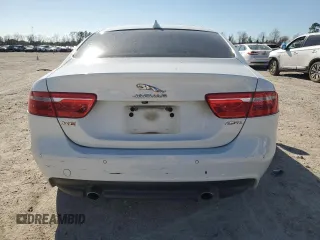 2019 Jaguar XE 25t Premium with VIN SAJAD4FX9KCP49404, listed as a Copart auction lot 48826365 with 141,322 mi miles and Salvage Title. Bid and sale history available at DreamBid. Image 6.