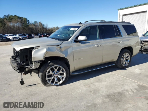 2015 GMC Yukon SLT with VIN 1GKS1BKC7FR120802, listed as a Copart auction lot 87430984 with 191,829 mi miles and Salvage Title. Bid and sale history available at carsss.com. Image 1.