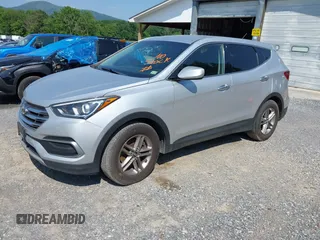 2018 Hyundai Santa Fe 2.4L z VIN 5XYZTDLB1JG546708, wystawiony jako IAAI lot #42399917 z przebiegiem 131 932 mil mil oraz . Historia ofert i sprzedaży dostępna na DreamBid. Obrazek 2.
