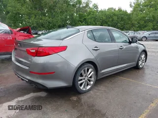 2014 Kia Optima SXL Turbo with VIN 5XXGR4A68EG303094, listed as a IAAI auction lot 42207175 with 105,521 mi miles and . Bid and sale history available at DreamBid. Image 4.