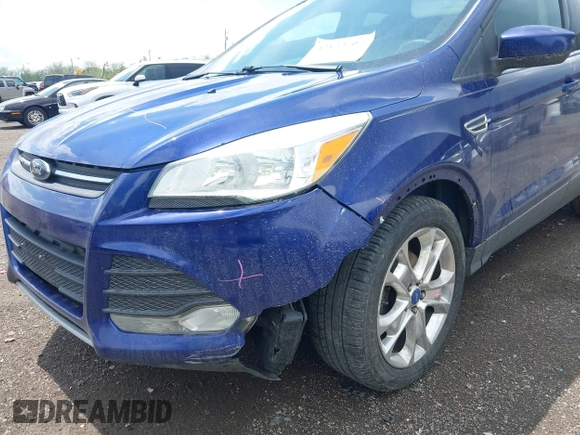 2013 Ford Escape SE with VIN 1FMCU0GXXDUA71589, listed as a IAAI auction lot 42122707 with 144,972 mi miles and . Bid and sale history available at carsss.com. Image 6.