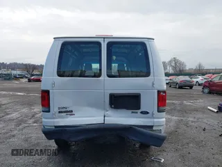 2013 Ford Econoline Cargo Commercial with VIN 1FTNE1EW2DDB11061, listed as a IAAI auction lot 41808318 with 230,677 mi miles. Bid and sale history available at carsss.com. Image 15.