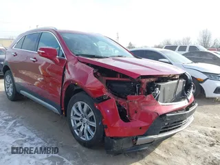 2021 Cadillac XT4 FWD Premium Luxury with VIN 1GYFZCR44MF019607, listed as a IAAI auction lot 41363064 with 24,364 mi miles. Bid and sale history available at carsss.com. Image 1.