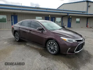 2018 Toyota Avalon XLE with VIN 4T1BK1EB0JU285145, listed as a Copart auction lot 53906515 with 95,642 mi miles and Salvage Title. Bid and sale history available at DreamBid. Image 4.