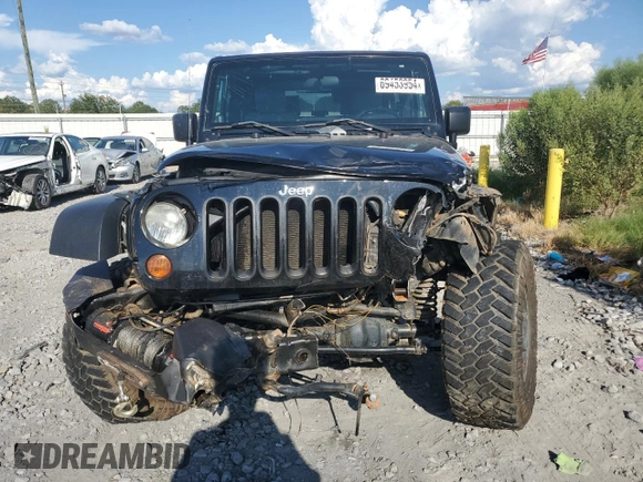 2010 Jeep Wrangler Rubicon with VIN 1J4BA6D10AL109001, listed as a Copart auction lot 69453954 with 137,821 mi miles and Salvage title. Bid and sale history available at DreamBid. Image 5.