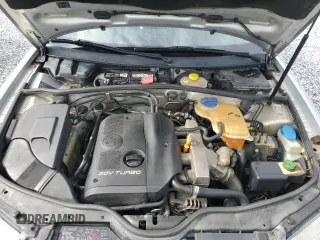 2000 Volkswagen Passat z VIN WVWNA23B6YE238932, wystawiony jako Copart lot #59837575 z przebiegiem 151 157 mil mil oraz Szkoda całkowita • Salvage title. Historia ofert i sprzedaży dostępna na DreamBid. Obrazek 12.