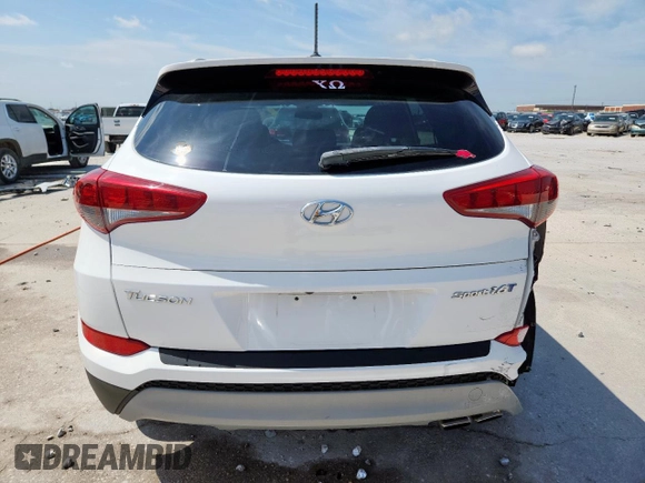 2017 Hyundai Tucson Sport z VIN KM8J33A29HU591930, wystawiony jako Copart lot #60057505 z przebiegiem 70 037 mil mil oraz Szkoda całkowita • Salvage title. Historia ofert i sprzedaży dostępna na DreamBid. Obrazek 6.