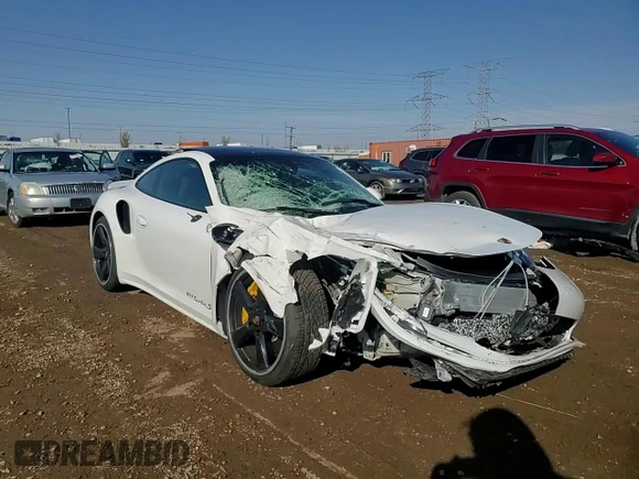 2015 Porsche 911 Turbo S with VIN WP0AD2A9XFS160370, listed as a Copart auction lot 77165054 with 19,235 mi miles and Salvage Title. Bid and sale history available at DreamBid. Image 10.