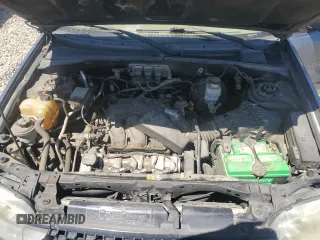 2005 Ford Escape XLT with VIN 1FMCU93105KA43061, listed as a Copart auction lot 62324555 with 121,517 mi miles and Salvage title. Bid and sale history available at DreamBid. Image 11.