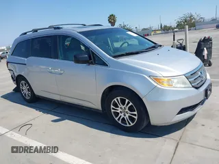 2012 Honda Odyssey EX-L with VIN 5FNRL5H67CB064658, listed as a IAAI auction lot 42735986 with 168,498 mi miles and . Bid and sale history available at DreamBid. Image 1.
