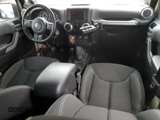 2018 Jeep Wrangler JK Unlimited Rubicon with VIN 1C4BJWFG4JL891312, listed as a Copart auction lot 87041334 with 51,286 mi miles and Salvage Title. Bid and sale history available at carsss.com. Image 8.