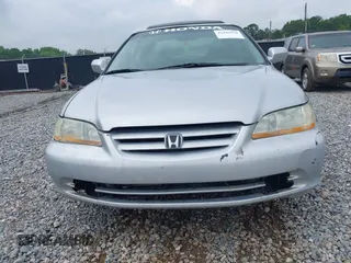 2002 Honda Accord EX z VIN 1HGCG16562A084499, wystawiony jako IAAI lot #42446830 z przebiegiem 241 615 mil mil oraz . Historia ofert i sprzedaży dostępna na DreamBid. Obrazek 6.
