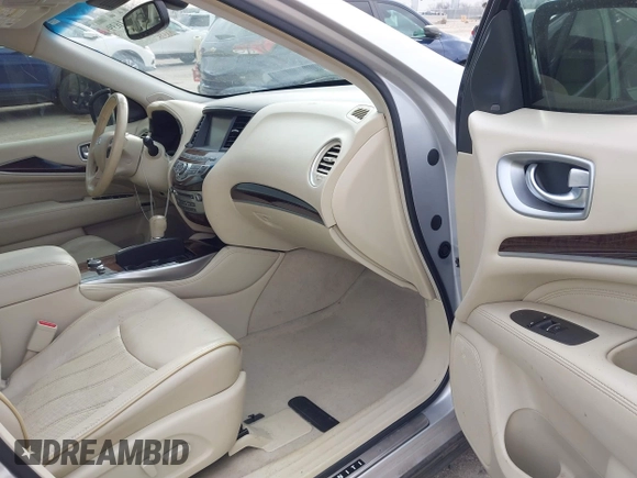 2013 Infiniti JX35 with VIN 5N1AL0MM8DC352896, listed as a IAAI auction lot 41561639 with 158,533 mi miles and . Bid and sale history available at DreamBid. Image 5.