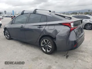2022 Toyota Prius L Eco z VIN JTDKAMFU8N3180132, wystawiony jako Copart lot #52928455 z przebiegiem 13 547 mil mil oraz Szkoda całkowita • Salvage title. Historia ofert i sprzedaży dostępna na DreamBid. Obrazek 2.