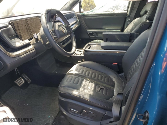 2022 Rivian R1T Adventure Package with VIN 7FCTGAAA4NN010881, listed as a Copart auction lot 58783584 with 0 mi miles and Salvage Title. Bid and sale history available at carsss.com. Image 7.