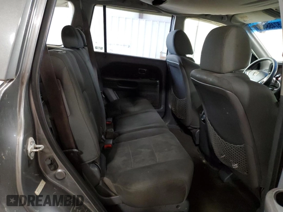 2007 Honda Pilot LX z VIN 5FNYF18157B007168, wystawiony jako Copart lot #57458405 z przebiegiem 225 139 mil mil oraz Czysty tytuł • Clean title. Historia ofert i sprzedaży dostępna na DreamBid. Obrazek 11.