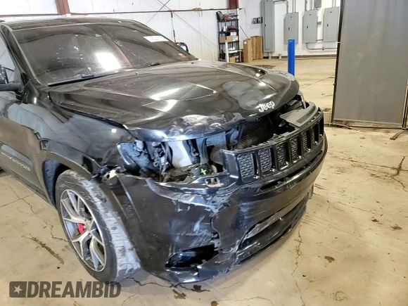 2017 Jeep Grand Cherokee SRT with VIN 1C4RJFDJ1HC760023, listed as a Copart auction lot 45227385 with 95,135 mi miles and Salvage Title. Bid and sale history available at carsss.com. Image 14.
