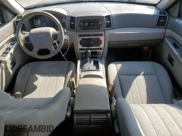 2006 Jeep Grand Cherokee Laredo with VIN 1J4HS48N96C357909, listed as a Copart auction lot 77551154 with 136,235 mi miles and Salvage Title. Bid and sale history available at carsss.com. Image 8.
