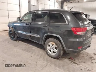 2011 Jeep Grand Cherokee 70th Anniversary with VIN 1J4RR4GG3BC745652, listed as a IAAI auction lot 41133698 with 217,948 mi miles. Bid and sale history available at carsss.com. Image 3.