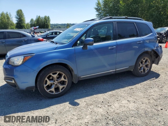 2017 Subaru Forester Touring with VIN JF2SJAWC2HH429099, listed as a Copart auction lot 64671135 with 104,709 mi miles and Salvage title. Bid and sale history available at DreamBid. Image 1.