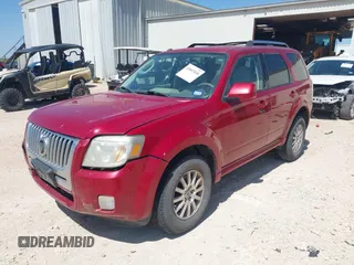 2011 Mercury Mariner Premier with VIN 4M2CN8HG3BKJ08774, listed as a IAAI auction lot 42007038 with 127,551 mi miles and . Bid and sale history available at DreamBid. Image 2.