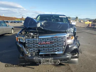 2021 GMC Canyon 4WD Denali with VIN 1GTG6EEN9M1150283, listed as a Copart auction lot 45810795 with 52,130 mi miles and Non Repairable. Bid and sale history available at carsss.com. Image 5.