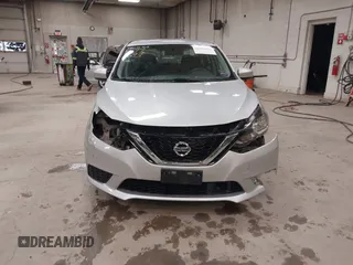 2019 Nissan Sentra S z VIN 3N1AB7AP7KY440764, wystawiony jako IAAI lot #41996693 z przebiegiem 34 594 mil mil oraz . Historia ofert i sprzedaży dostępna na DreamBid. Obrazek 13.