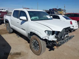 2023 Toyota Tacoma 4WD SR with VIN 3TMCZ5AN7PM653250, listed as a IAAI auction lot 41673534 with 19,496 mi miles. Bid and sale history available at carsss.com. Image 1.
