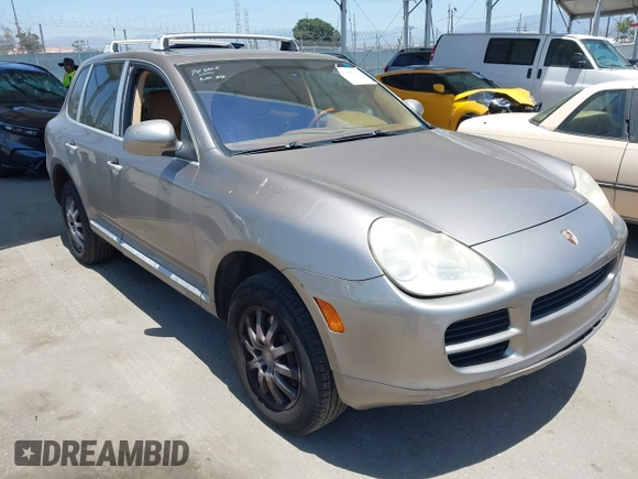 2005 Porsche Cayenne z VIN WP1AA29P55LA24408, wystawiony jako IAAI lot #42398234 z przebiegiem 237 890 mil mil oraz . Historia ofert i sprzedaży dostępna na DreamBid. Obrazek 1.
