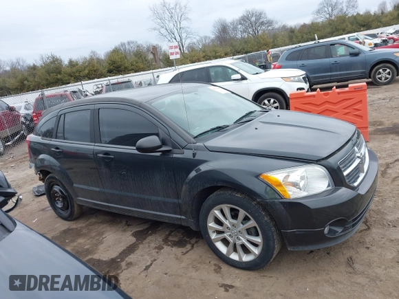 2011 Dodge Caliber Heat with VIN 1B3CB5HA7BD110672, listed as a IAAI auction lot 41709487 with 59,679 mi miles and . Bid and sale history available at DreamBid. Image 13.