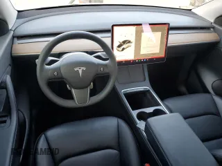 2022 Tesla Model Y Performance with VIN 7SAYGDEF1NF342071, listed as a Copart auction lot 43084905 with 30,534 mi miles and Salvage Title. Bid and sale history available at DreamBid. Image 8.