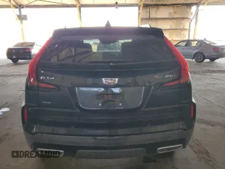 2024 Cadillac XT4 AWD Premium Luxury with VIN 1GYFZDR47RF153590, listed as a Copart auction lot 42846045 with 2,261 mi miles and Salvage title. Bid and sale history available at DreamBid. Image 6.