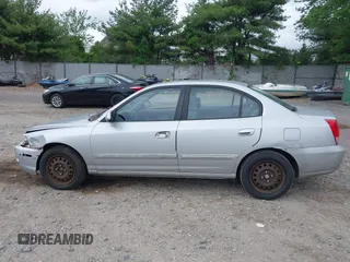 2004 Hyundai Elantra GLS z VIN KMHDN46D14U790939, wystawiony jako IAAI lot #42194909 z przebiegiem 108 180 mil mil oraz . Historia ofert i sprzedaży dostępna na DreamBid. Obrazek 14.
