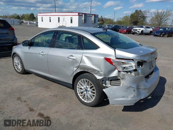 2012 Ford Focus SEL with VIN 1FAHP3H29CL151658, listed as a IAAI auction lot 42060139 with 149,547 mi miles and . Bid and sale history available at carsss.com. Image 3.