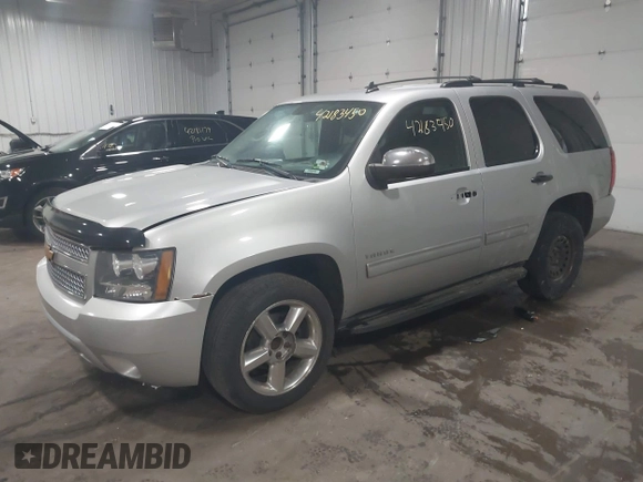 2012 Chevrolet Tahoe LT z VIN 1GNSCBE01CR326465, wystawiony jako IAAI lot #42183450 z przebiegiem 220 129 mil mil oraz . Historia ofert i sprzedaży dostępna na DreamBid. Obrazek 17.