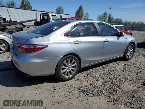 2015 Toyota Camry LE with VIN 4T1BD1FKXFU156118, listed as a Copart auction lot 52772745 with 129,600 mi miles and Salvage Title. Bid and sale history available at DreamBid. Image 3.