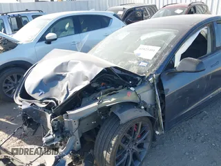 2022 Tesla Model 3 Performance with VIN 5YJ3E1EC3NF194197, listed as a IAAI auction lot 41825401 with Not Provided miles and . Bid and sale history available at DreamBid. Image 6.