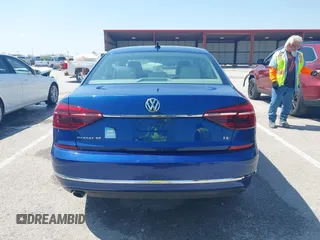 2017 Volkswagen Passat 1.8T SE with VIN 1VWBT7A31HC021299, listed as a IAAI auction lot 41961686 with 135,912 mi miles. Bid and sale history available at carsss.com. Image 17.